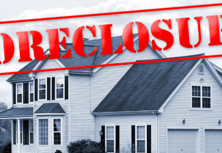 white house with big red FORCLOSURE stamp on it